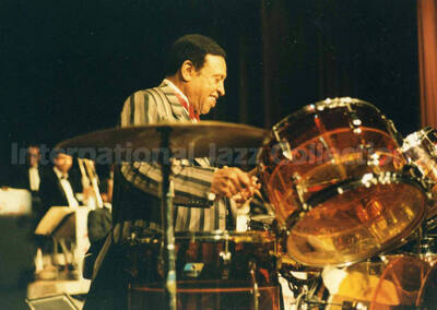 4 x 6 inch photograph. Lionel Hampton playing the drums, in Canada