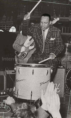 4 1/2 x 3 inch photograph. Lionel Hampton playing Trixon drums