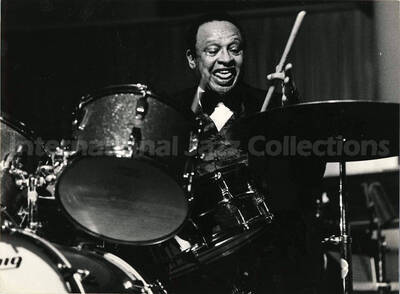 7 x 9 1/2 inch photograph. Lionel Hampton playing the drums