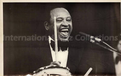 6 x 9 1/2 inch photograph. Lionel Hampton playing the drums