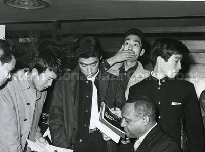 8 x 10 inch photograph. Lionel Hampton autographing for fans [in Japan]