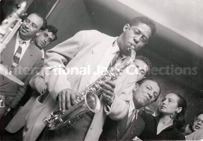 5 x 7 inch photograph. Unidentified saxophonist in Israel. This photograph has inscription on back