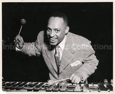 8 x 10 inch photograph. Lionel Hampton playing the vibraphone