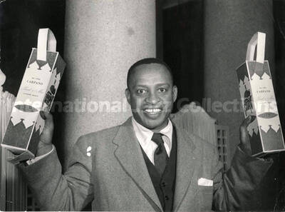 7 x 9 1/2 inch photograph. Lionel Hampton poses for Carpano vermouth, in Italy