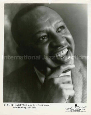 10 x 8 inch promotional photograph. Lionel Hampton. Inscribed at the bottom of the photograph: Lionel Hampton and His Orchestra; Glad-Hamp Records
