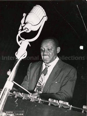 9 1/2 x 7 inch photograph. Lionel Hampton playing the vibraphone