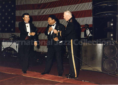5 x 7 inch photograph. Lionel Hampton on the occasion of the 214th Marine Corps Officers' Ball with CMC at the Washington Hilton