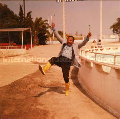 3 1/2 x 3 1/2 inch photograph. Lionel Hampton cheers at a marine mammal park