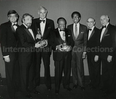 8 x 10 inch photograph. Lionel Hampton with unidentified men on the occasion of his receiving the Lifetime Achievement Award of B'nai B'rith, at the Sheraton Centre in New York