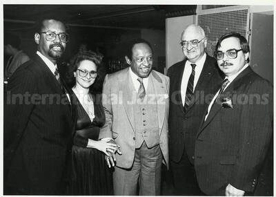 5 x 7 inch photograph. Lionel Hampton with unidentified persons