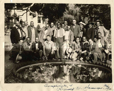 8 x 10 inch photograph. Group of unidentified men. This photograph has a dedication from [Reginald W. Hà?]