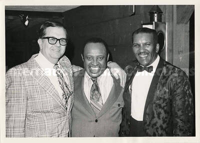 5 x 7 inch photograph. Lionel Hampton with two unidentified men
