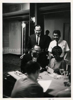 6 1/2 x 4 3/4 inch photograph. Lionel Hampton with unidentified persons