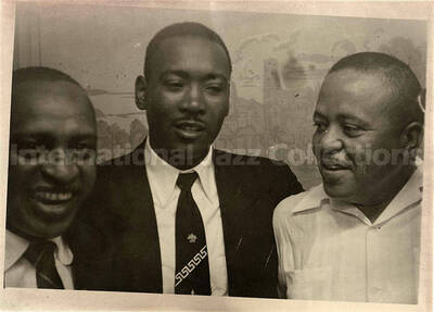 5 x 7 inch photograph. Lionel Hampton with unidentified men