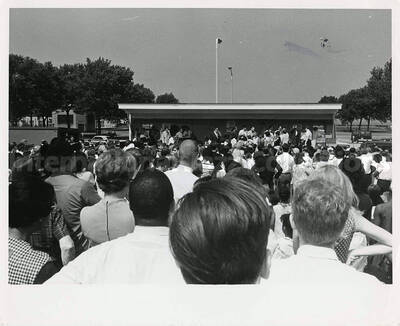8 x 10 inch photograph. Lionel Hampton at an outdoor concert. Posters on the background of the stage reads: Fun Day