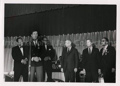 5 x 7 inch photograph. Lionel Hampton with unidentified persons