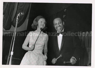 5 x 7 inch photograph. Lionel Hampton with unidentified woman