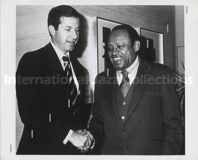 8 x 10 inch photograph. Lionel Hampton with unidentified man [at the Aurora Super Fair' 74]
