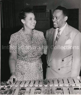 10 x 8 inch photograph. Lionel Hampton with unidentified woman