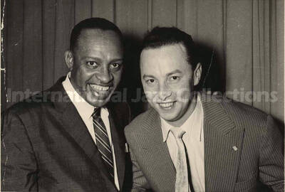 3 1/2 x 5 inch photograph. Lionel Hampton with a man. Handwritten on back of the photograph: Joe. Pelsmaeker. Antwerp, Belgium