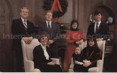3 1/2 x 5 3/4 inch photograph. Christmas portrait of unidentified family