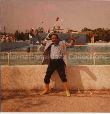 3 1/2 x 3 1/2 inch photograph. Lionel Hampton cheers at a marine mammal park