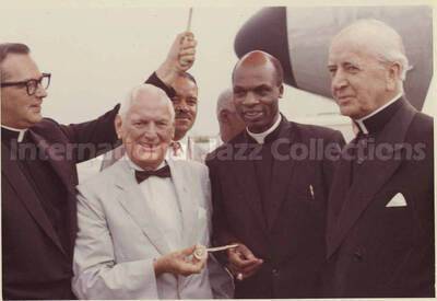 3 1/2 x 5 inch photograph. Unidentified men including religious ones. Stamped on the back of the photograph: Souvenir 48th Annual Convention Knights and Ladies of St. Peter Claver, Aug. 3-8, 1963, Indianapolis (ID)