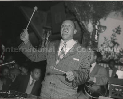 8 x 10 inch photograph. Lionel Hampton playing the vibraphone