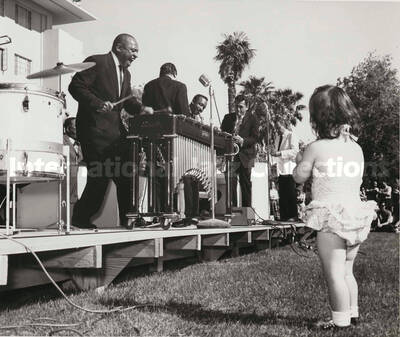 7 x 9 inch photograph. Lionel Hampton playing the vibraphone at an outdoor concert