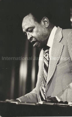 5 1/2 x 3 1/2 inch photograph. Lionel Hampton playing the vibraphone