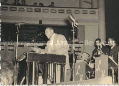 2 3/4 x 4 inch photograph. Lionel Hampton playing the vibraphone