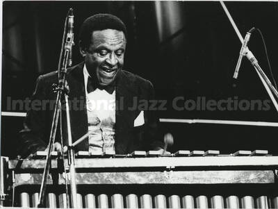4 3/4 x 6 1/2 inch photograph. Lionel Hampton playing the vibraphone