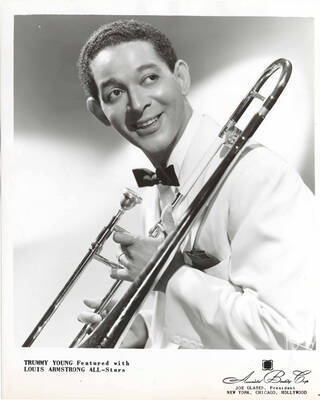 10 x 8 inch promotional photograph. Trummy Young. Inscribed at the bottom of the photograph: Trummy Young Featured with Louis Armstrong All-Stars