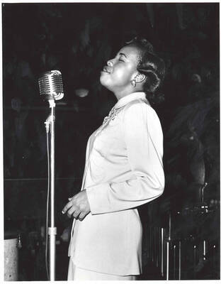 10 x 8 inch photograph. Unidentified vocalist