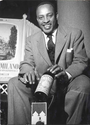 Lionel Hampton poses for Carpano Vermouth, in Italy. 9 1/2 x 7 inch photograph.