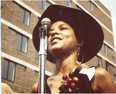 8 x 10 inch photograph. Ruby Dee performing at the Grand Opening of Lionel Hampton Houses