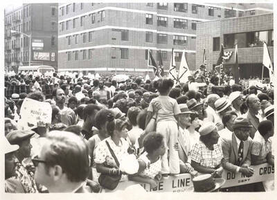 8 x 10 inch photograph. A crowd gathered at the Grand Opening of Lionel Hampton Houses