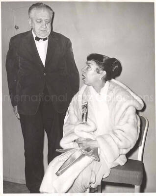10 x 8 inch photograph. Gladys Hampton with unidentified man. She is wearing the medal of the Inaugural Committee of President Dwight D. Eisenhower