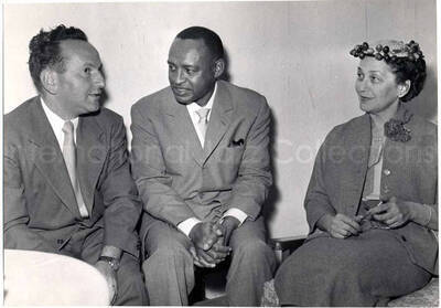 5 x 7 inch photograph. Lionel Hampton with unidentified man and woman [at Swiss Village] in Israel