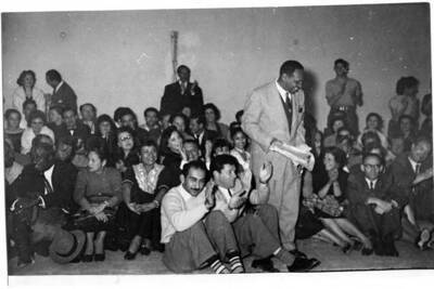 5 x 7 inch photograph. Gladys and Lionel Hampton with band in Israel