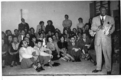 5 x 7 inch photograph. Gladys and Lionel Hampton with band in Israel
