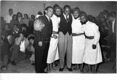 5 x 7 inch photograph. Gladys and Lionel Hampton with band in Israel