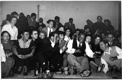 5 x 7 inch photograph. Gladys and Lionel Hampton with band in Israel