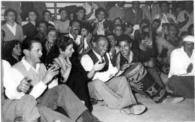 5 x 7 inch photograph. Gladys and Lionel Hampton with band in Israel
