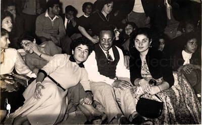 5 x 7 inch photograph. Gladys and Lionel Hampton with band in Israel