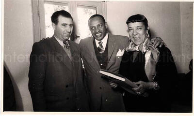 5 x 8 inch photograph. Gladys and Lionel Hampton with band in Israel. Gladys and Lionel Hampton with unidentified man