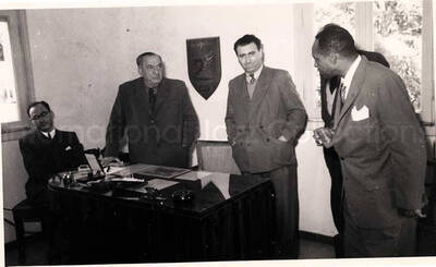 5 x 8 inch photograph. Gladys and Lionel Hampton with band in Israel. Lionel Hampton with unidentified men