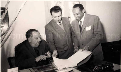 5 x 8 inch photograph. Gladys and Lionel Hampton with band in Israel. Lionel Hampton with unidentified men