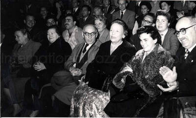 5 x 8 inch photograph. Lionel Hampton performing with band in Israel. Unidentified persons in the audience