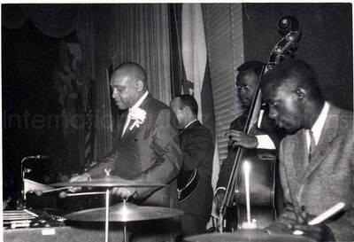 4 x 5 1/2 inch photograph. Lionel Hampton on vibraphone with band, which includes guitarist Billy Mackel, at the Youth Aliyah conference, Israel